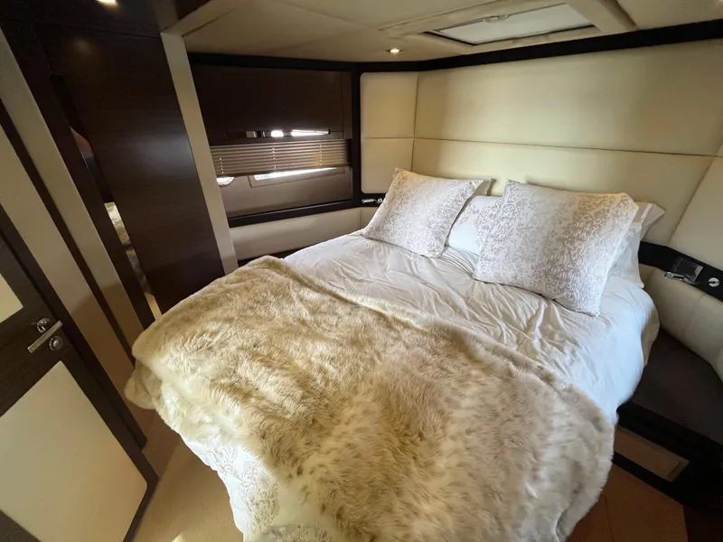 Slide: The Image of Luxurious bedroom interior of 2014 Azimut 55S yacht with plush bedding and elegant decor. - 25