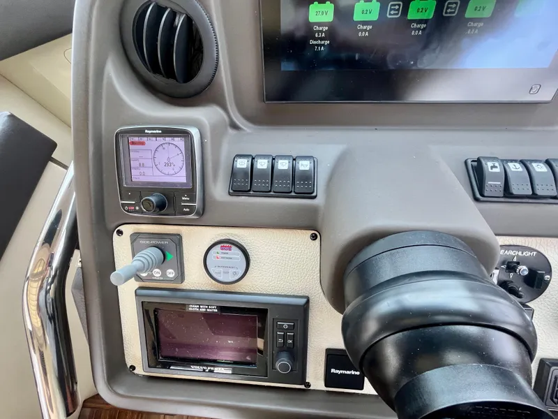 Slide: The Image of Control panel of a 2014 Azimut 55S yacht with navigation and monitoring systems. - 41