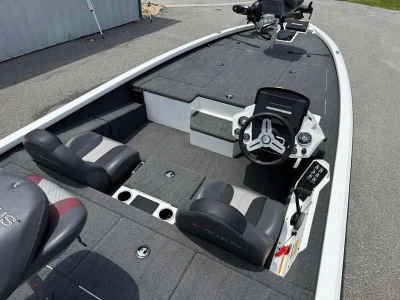 Slide: The Image of 2018 Vexus AVX 1980 boat interior with steering wheel and seating, featuring modern design. - 10
