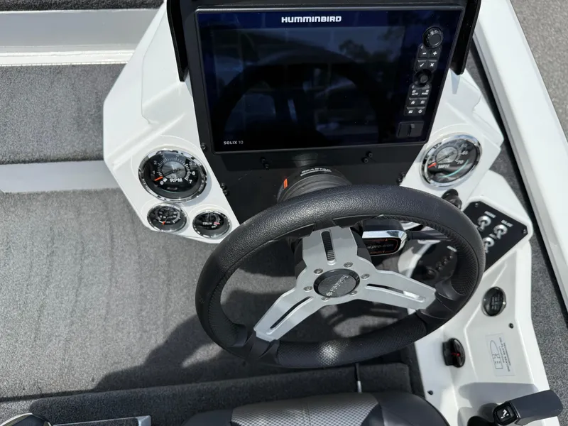 Slide: The Image of 2018 Vexus AVX 1980 boat dashboard with steering wheel and Humminbird Solix 10 display. - 11