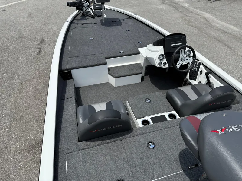 Slide: The Image of 2018 Vexus AVX 1980 boat interior with steering console and seating. - 9
