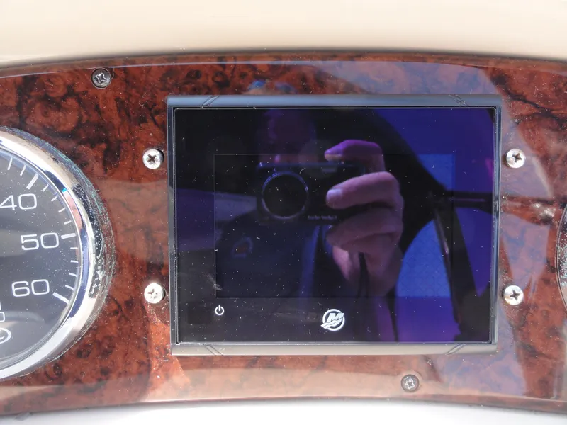 Slide: The Image of Dashboard of 2003 Sea Ray 380 Sundancer with speedometer and digital display. - 17