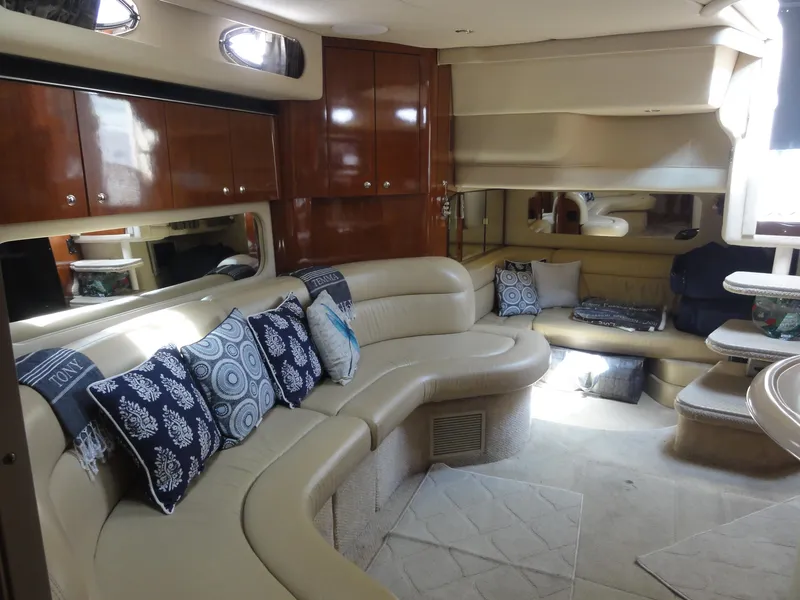 Slide: The Image of Luxurious interior of 2003 Sea Ray 380 Sundancer yacht with plush seating and elegant decor. - 30