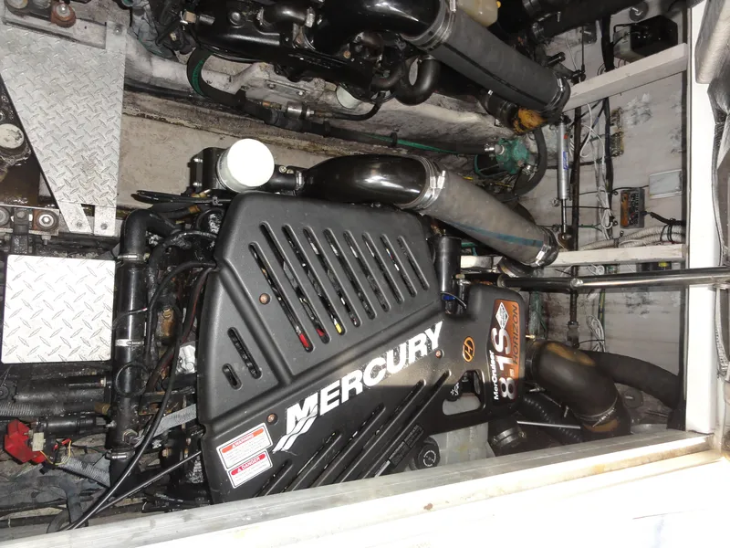 Slide: The Image of Engine compartment of a 2003 Sea Ray 380 Sundancer with Mercury 8.1S Horizon engine. - 34