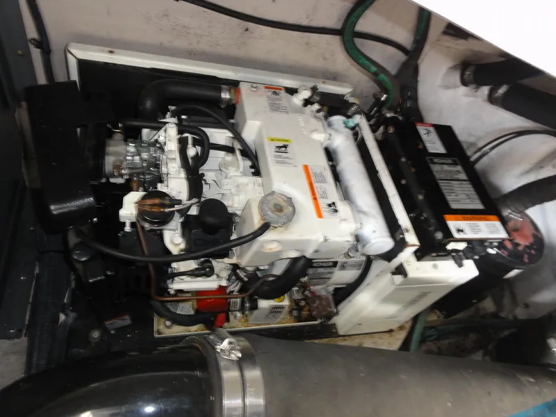 Slide: The Image of Engine compartment of a 2003 Sea Ray 380 Sundancer boat. - 38