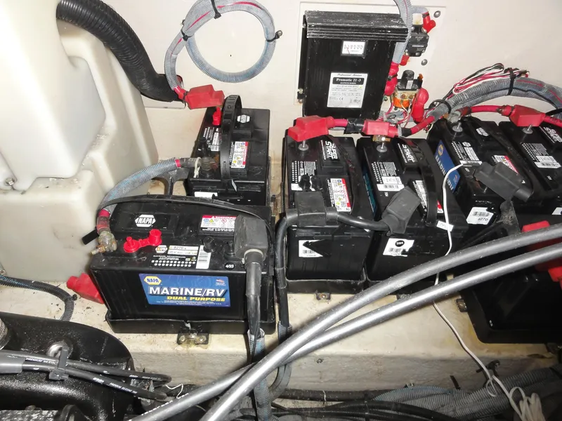 Slide: The Image of Marine batteries in a 2003 Sea Ray 380 Sundancer engine compartment. - 39