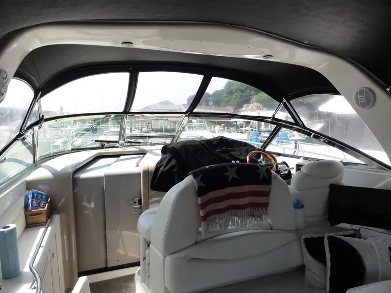 Slide: The Image of Interior of a 2003 Sea Ray 380 Sundancer yacht with marina view. - 5
