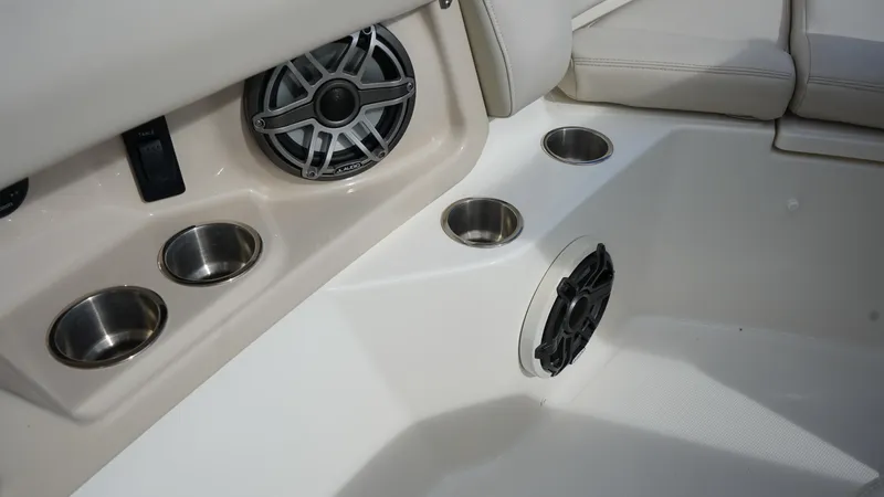 Slide: The Image of Interior of 2020 Boston Whaler 350 Realm featuring cup holders and speakers. - 23