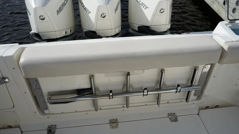 Slide: The Image of 2020 Boston Whaler 350 Realm boat with Mercury engines and rod holders. - 47
