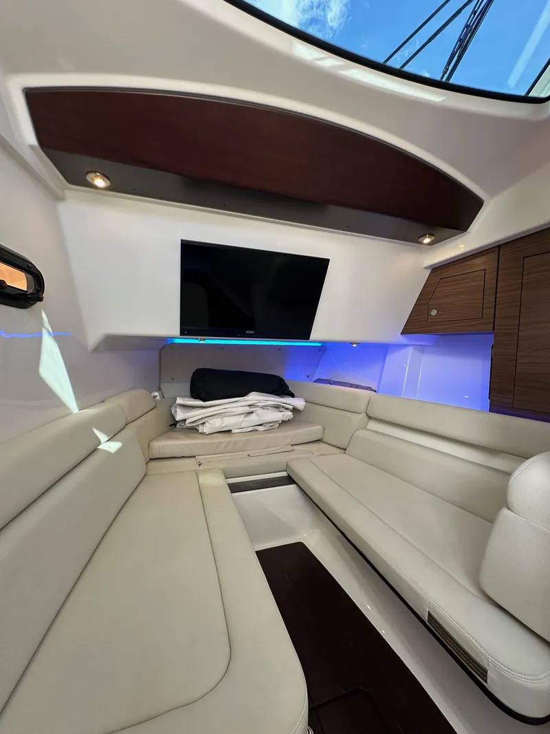 Slide: The Image of 2020 Boston Whaler 350 Realm interior with luxurious seating and modern design. - 55