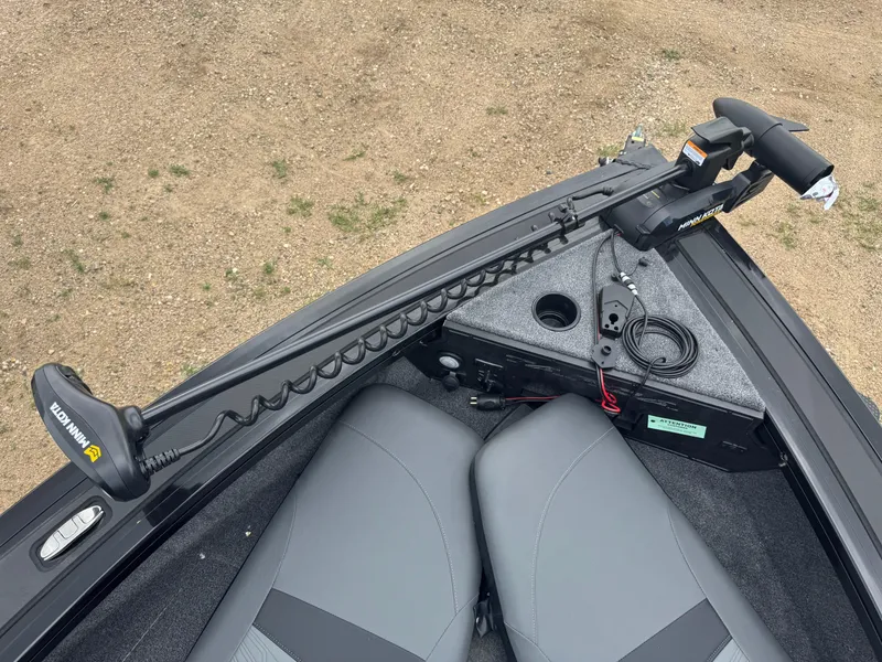 Slide: The Image of 2026 Tracker Targa V-18 Combo boat with Minn Kota trolling motor on deck. - 13