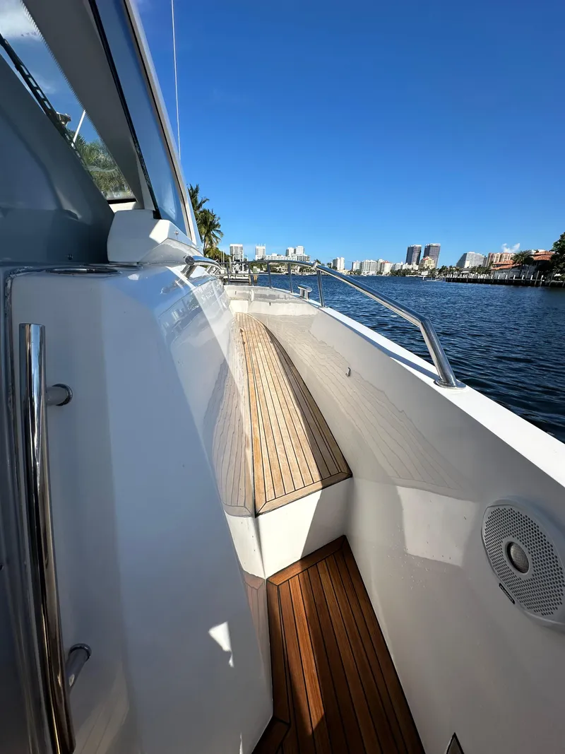 Slide: The Image of 2018 Azimut Verve 40 yacht with sleek deck design and waterfront view. - 15