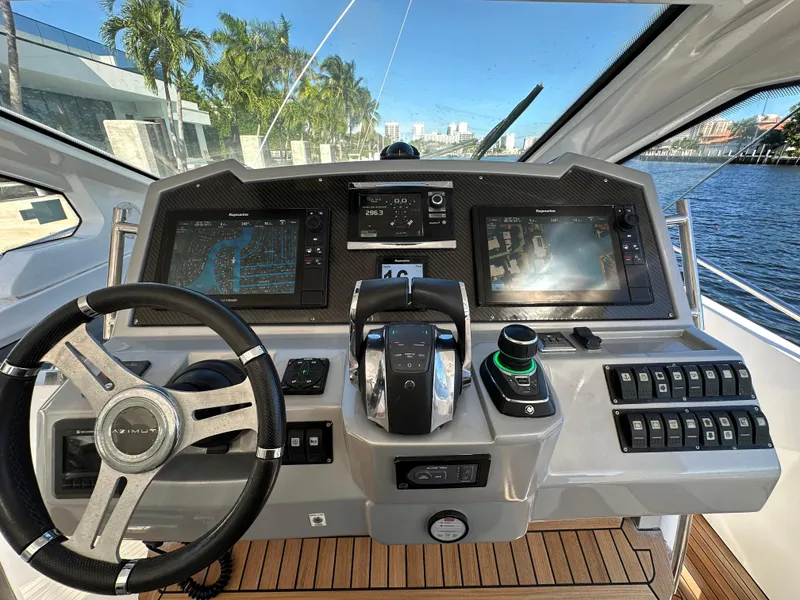 Slide: The Image of Cockpit of 2018 Azimut Verve 40 yacht with advanced navigation controls. - 19
