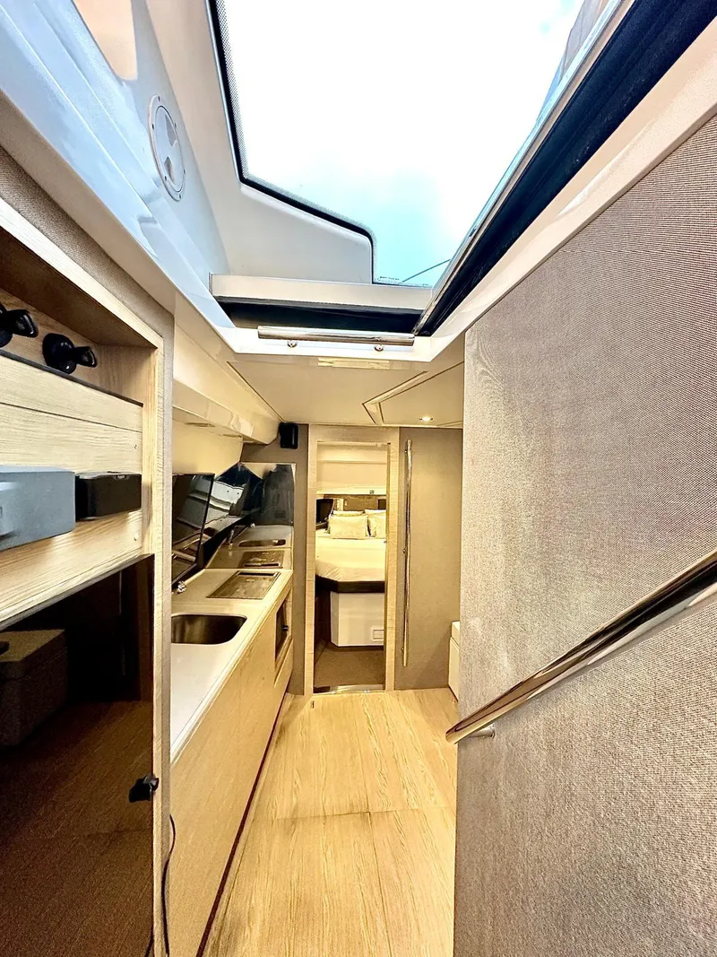 Slide: The Image of Interior of 2018 Azimut Verve 40 yacht, featuring modern kitchen and sleek design. - 29