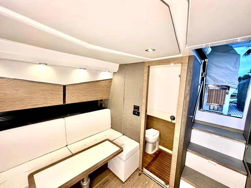 Slide: The Image of Luxurious interior of 2018 Azimut Verve 40 yacht with modern seating and compact bathroom. - 34