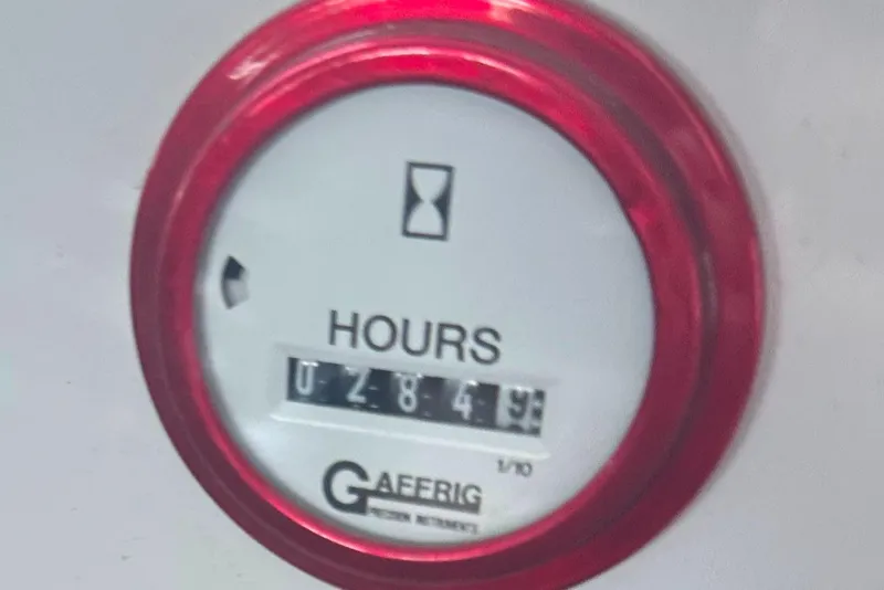 Slide: The Image of Hour meter reading 284.9 hours on Baja 342, 2000 model. - 40