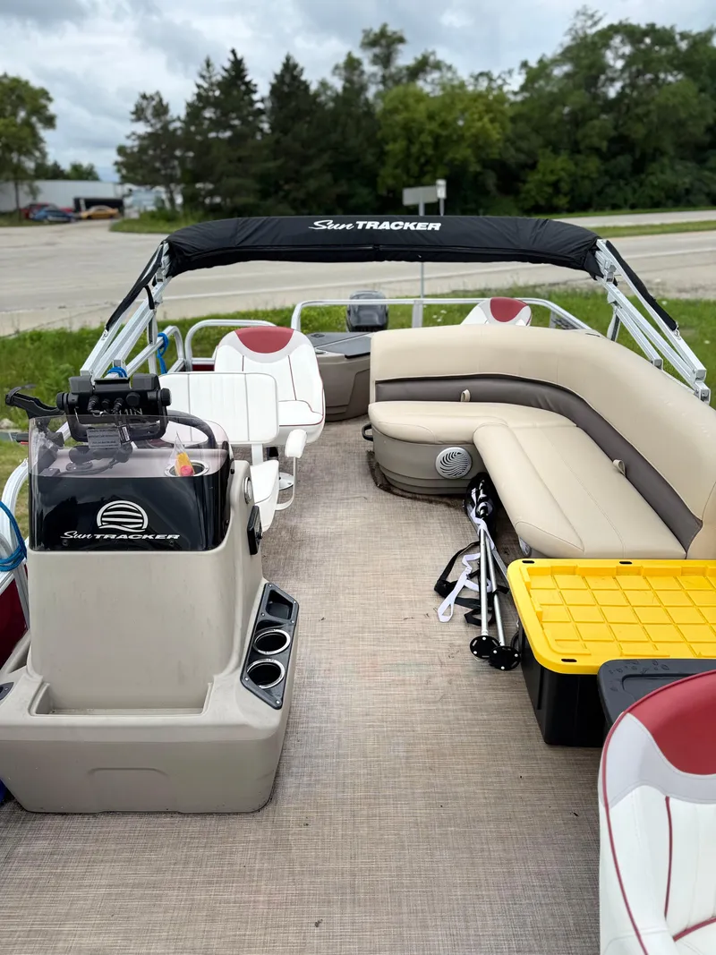 Slide: The Image of 2022 Sun Tracker Bass Buggy 18 DLX pontoon boat interior with seating and storage. - 15