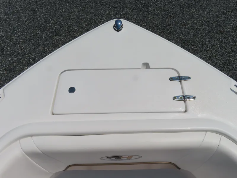 Slide: The Image of Bow of 2013 Sea Hunt Escape 211 LE boat with storage compartment. - 12