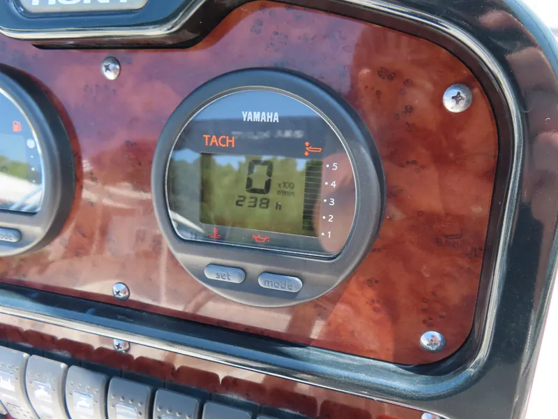 Slide: The Image of Yamaha tachometer on 2013 Sea Hunt Escape 211 LE boat dashboard. - 26