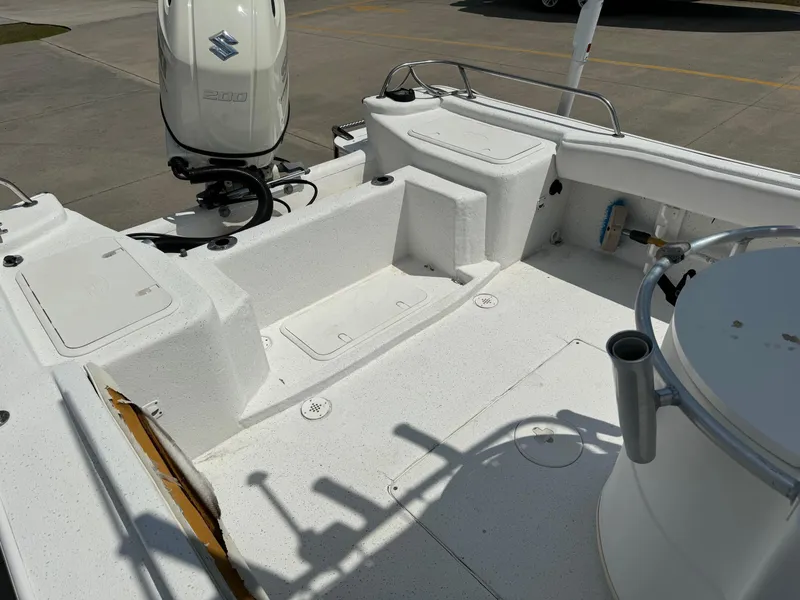 Slide: The Image of 2011 Carolina Skiff 25 Elite SS boat interior with Suzuki 200 outboard motor. - 6