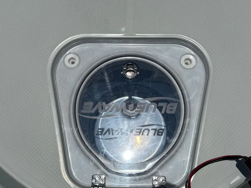 Slide: The Image of 2019 Blue Wave 2800 Pure Hybrid boat hatch with logo. - 8