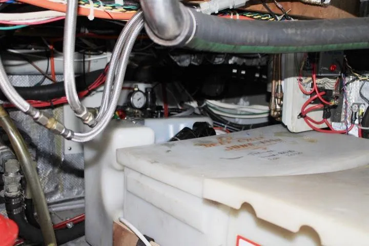 Slide: The Image of Engine room of a 1989 Eagle Pilothouse, showcasing wiring and mechanical components. - 50