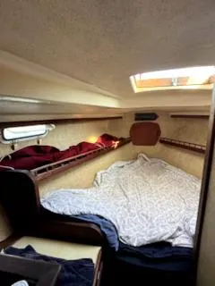 Slide: The Image of 1979 Morgan Out Island cabin interior with bed and skylight. - 9