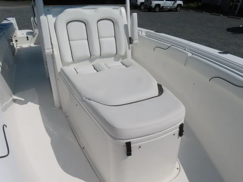 Slide: The Image of 2017 Sea Hunt Gamefish 27 boat with white cushioned seating. - 16