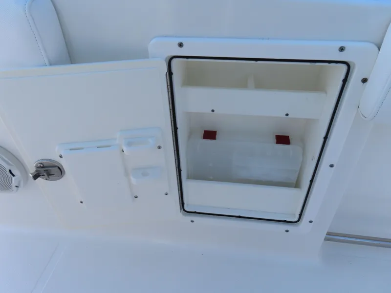 Slide: The Image of Open storage compartment on 2017 Sea Hunt Gamefish 27 boat. - 30