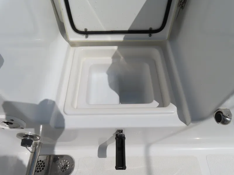Slide: The Image of Open storage compartment on 2017 Sea Hunt Gamefish 27 boat. - 42