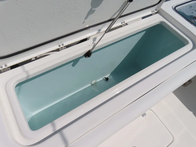 Slide: The Image of Open storage compartment on 2017 Sea Hunt Gamefish 27 boat. - 44