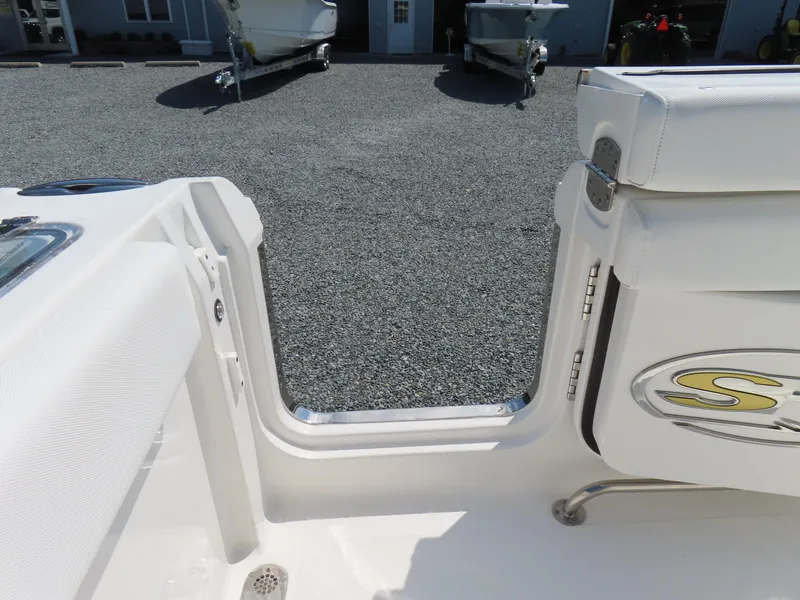 Slide: The Image of 2017 Sea Hunt Gamefish 27 boat interior with open transom door. - 49