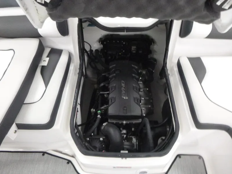Slide: The Image of 2025 Yamaha Boats AR195 engine compartment with visible components and seating area. - 15