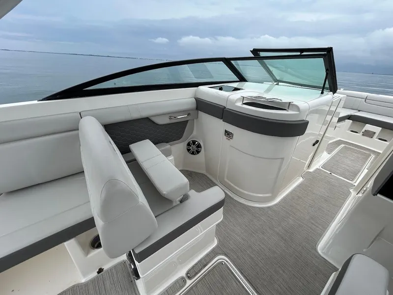 Slide: The Image of 2020 Sea Ray SDX 290 Outboard interior with sleek seating and modern design. - 18