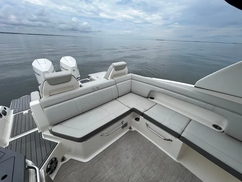 Slide: The Image of 2020 Sea Ray SDX 290 Outboard boat with spacious seating and dual Mercury engines. - 23