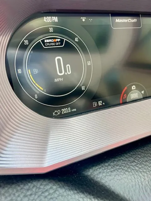 Slide: The Image of Dashboard of 2021 MasterCraft X24 boat showing speedometer and fuel gauge. - 17