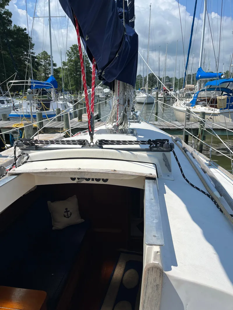 Slide: The Image of 1978 Bristol 29.9 sailboat docked at marina, view of cockpit and cabin entrance. - 4