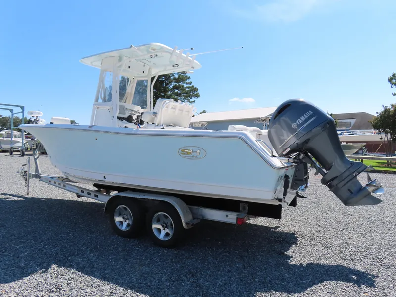 Slide: The Image of 2016 Sea Hunt Ultra 234 boat on trailer with Yamaha outboard motor. - 2