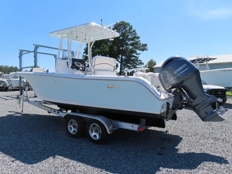 Slide: The Image of 2019 Sea Hunt Ultra 234 boat on trailer with Yamaha outboard motor. - 3