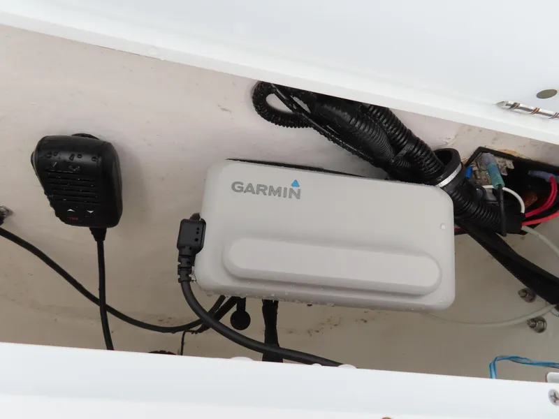 Slide: The Image of Garmin device installed in 2023 Sea Hunt Ultra 229 boat's compartment. - 27