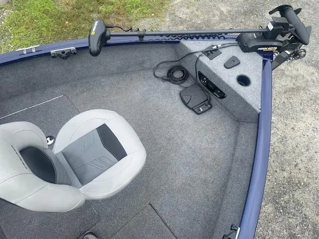 Slide: The Image of 2019 Tracker Pro Guide V-175 Combo boat interior with seating and trolling motor. - 18