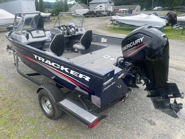 Slide: The Image of 2019 Tracker Pro Guide V-175 Combo boat with Mercury engine on trailer. - 2