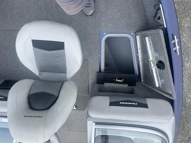Slide: The Image of 2019 Tracker Pro Guide V-175 Combo boat interior with seating and storage compartments. - 22