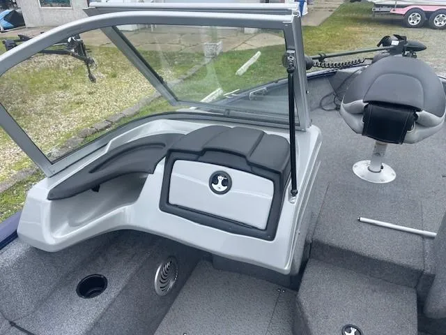 Slide: The Image of 2019 Tracker Pro Guide V-175 Combo boat interior with seating and windshield. - 25