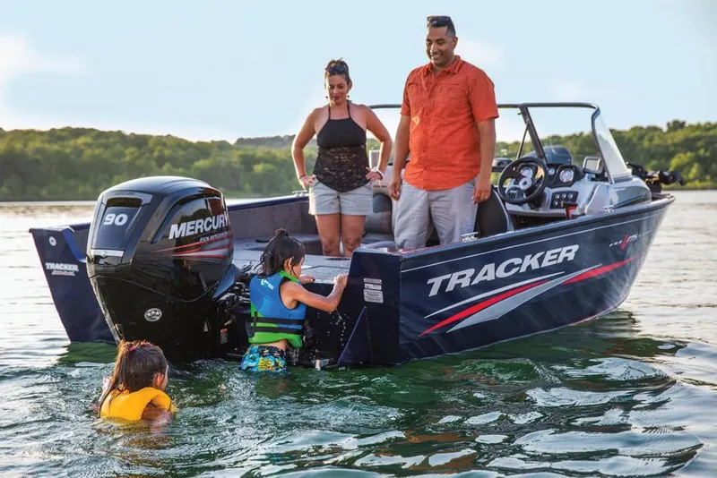 Slide: The Image of Family enjoying a day on a 2019 Tracker Pro Guide V-175 Combo boat. - 38