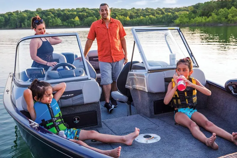 Slide: The Image of Family enjoying a day on a 2019 Tracker Pro Guide V-175 Combo boat. - 39