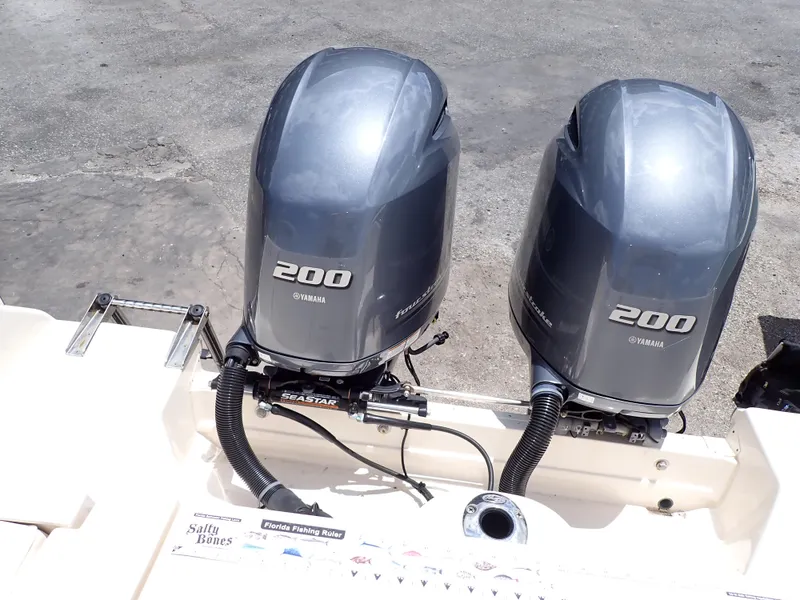 Slide: The Image of Twin Yamaha 200 outboard engines on a 2019 Grady-White Freedom 275 boat. - 10