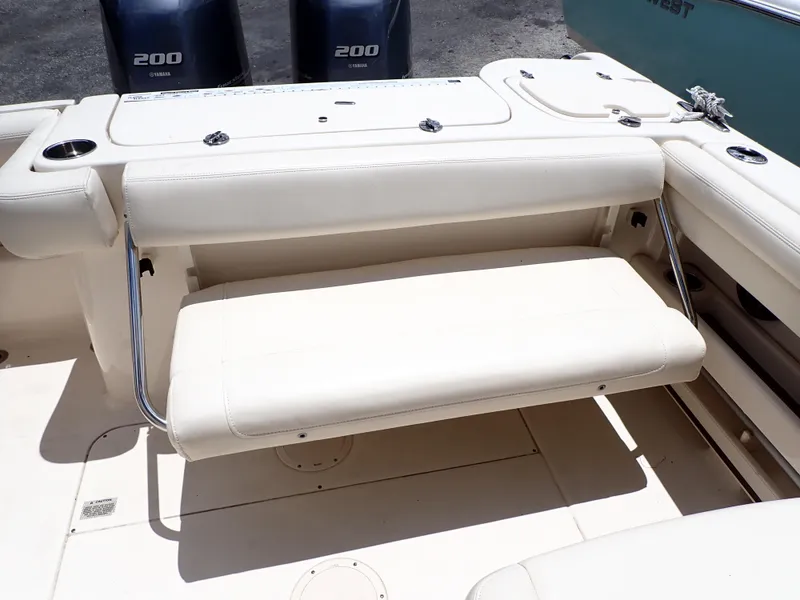 Slide: The Image of 2019 Grady-White Freedom 275 boat with twin 200 HP engines and foldable bench seat. - 12