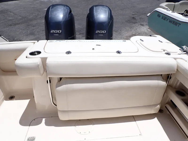 Slide: The Image of 2019 Grady-White Freedom 275 boat with twin 200 horsepower engines. - 13