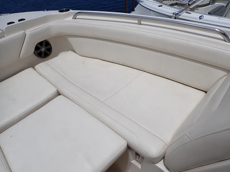 Slide: The Image of 2019 Grady-White Freedom 275 boat with spacious white cushioned seating. - 26